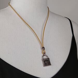 Stigma Silver Tone Crown Lock Pendant on Cord